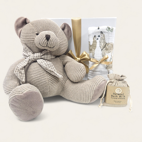 Big Ted Gift Box featuring a cuddly teddy, cotton muslin swaddle, soothing bath milk, and elegant gift packaging.