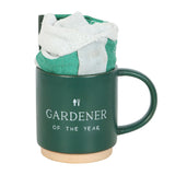 Gardener Mug and Glove Set featuring a 'Gardener of the Year' mug and durable gloves, perfect for gardening enthusiasts.