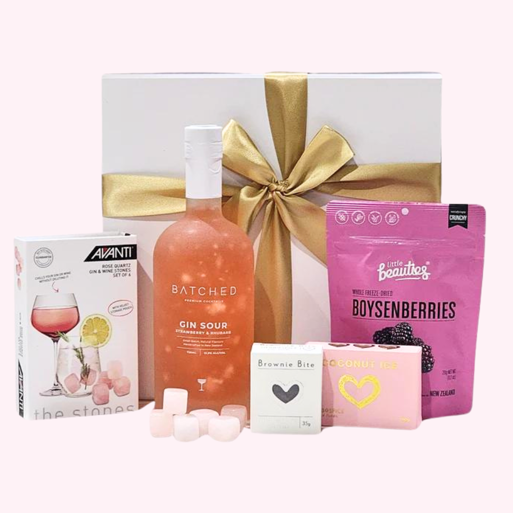 Refreshing Gin gift box featuring rose quartz wine stones, gin sour, brownie bites, and freeze-dried boysenberries.