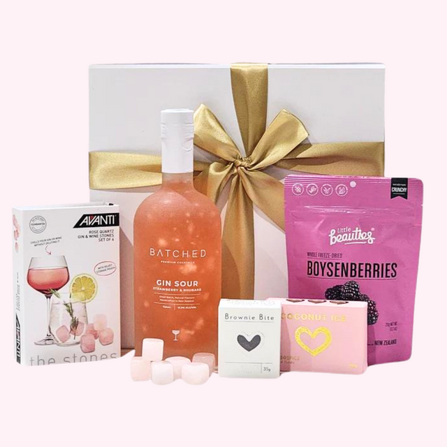 Refreshing Gin gift box featuring rose quartz wine stones, gin sour, brownie bites, and freeze-dried boysenberries.