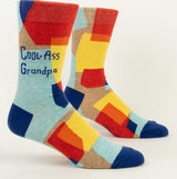 Men's socks featuring a quirky "Cool-Ass Grandpa" design, crafted from soft combed cotton for comfort and durability.