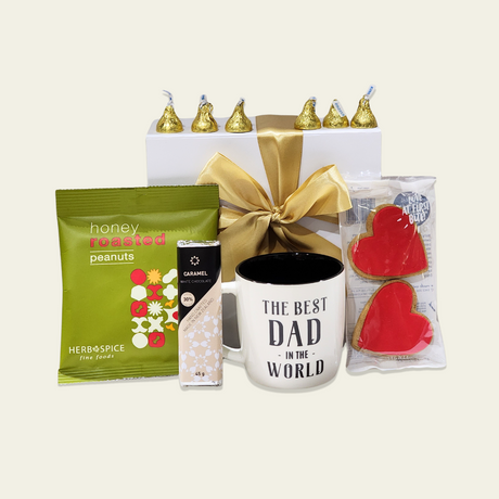 Gift box for Dad featuring a ceramic mug, gourmet snacks, and elegant packaging, perfect for any special occasion.