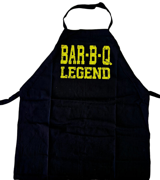 BBQ Legend Apron with bold design, made of durable cotton, adjustable fit, perfect gift for grilling enthusiasts.