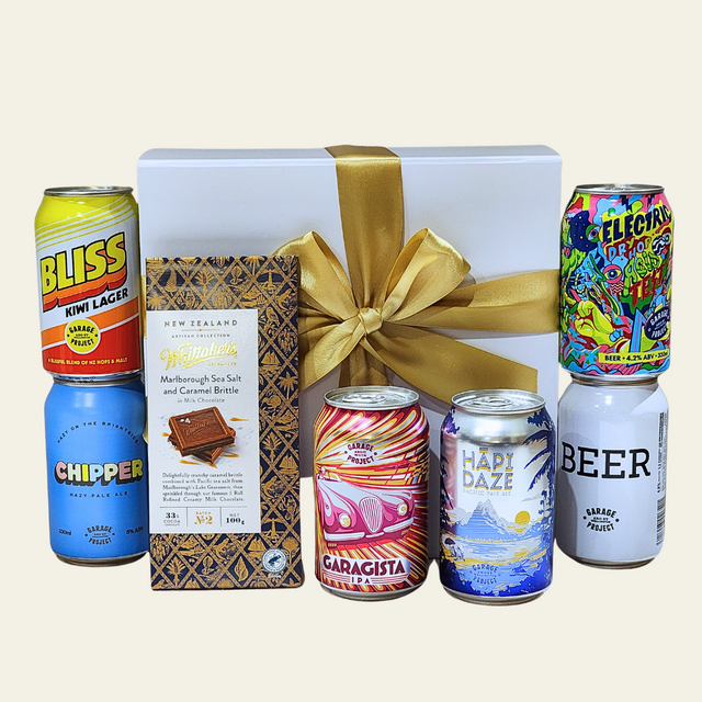 Craft Beer Sampler gift box featuring six unique brews and caramel brittle chocolate, beautifully assembled with a ribbon closure.