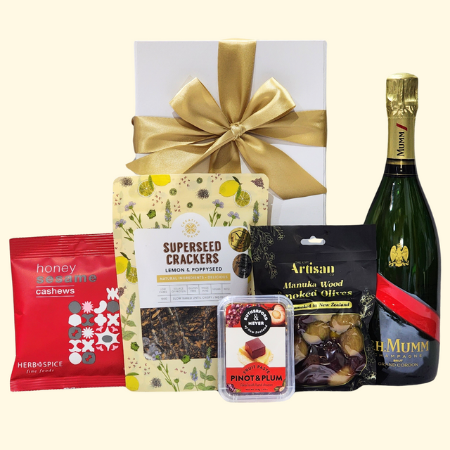 Elegant Champagne Celebration Gift Box featuring Mumm Champagne, gourmet olives, crackers, cashews, and fruit paste for special occasions.