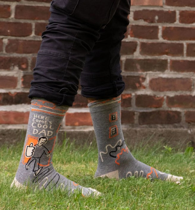 Stylish men's socks celebrating "Cool Dad," made from soft, durable materials for a comfortable fit.