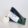 Men's bath bomb in Coconut and Spiced Vanilla, designed for relaxation and skin nourishment with premium ingredients.