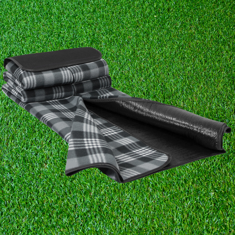 Smart picnic blanket measuring 1200mm x 1370mm; water-resistant, compact, and easy to carry for outdoor adventures.