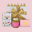 Colorful "Happy Birthday Bee-itch" gift box featuring gourmet chocolates, Manuka honey, and coconut treats for joyful celebrations.