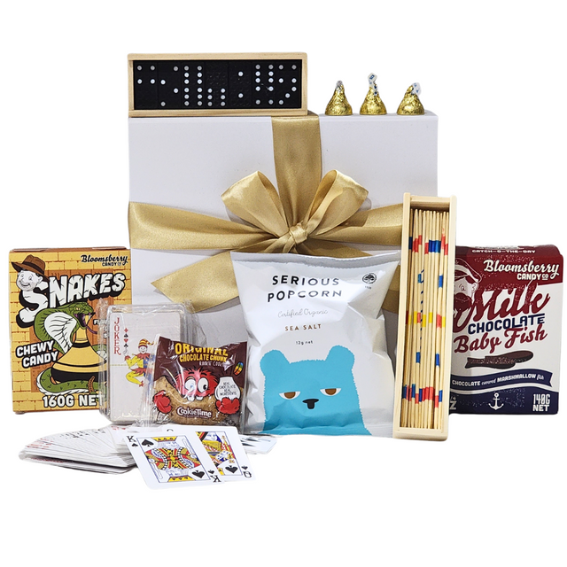 Festive Holiday Fun Gift Box filled with treats and games, including gummies, popcorn, chocolate, and classic card games.