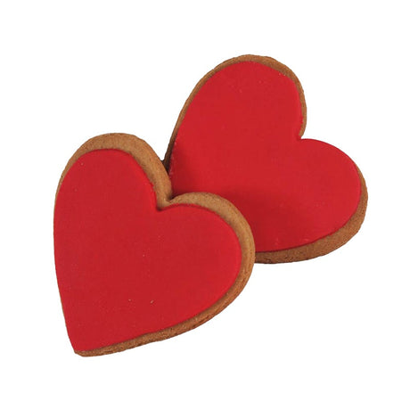 Heart-shaped ginger cookies with red icing, perfect for gifts and sweet celebrations by Molly Woppy, made in New Zealand.