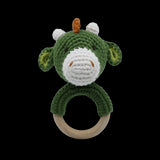 Charming 13cm handmade dinosaur rattle in soft cotton, perfect for sensory play and easy for tiny hands to grip.