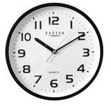 Modern 25 cm black wall clock, blending elegant minimalist design with accurate timekeeping for home or office decor.