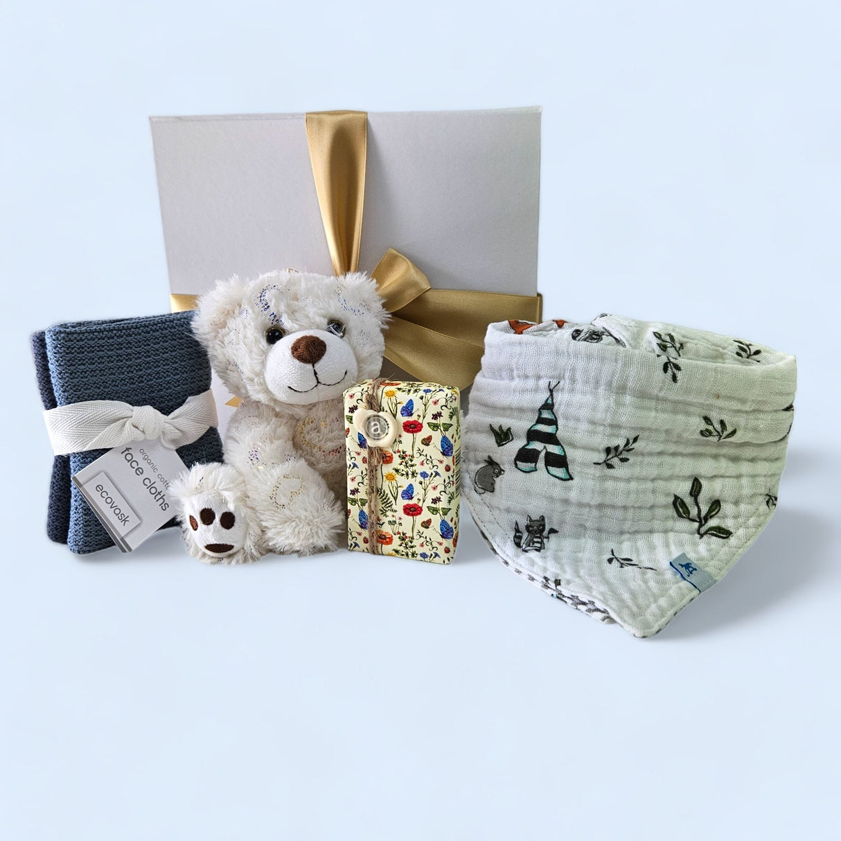 Exquisite Welcome Home Baby gift box featuring eco-friendly essentials for newborns and parents, elegantly packed.